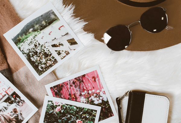 Travel inspired photo with hat and sunglasses