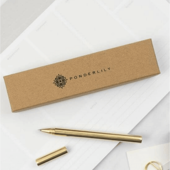 The Ponderlily brass pen with packaging